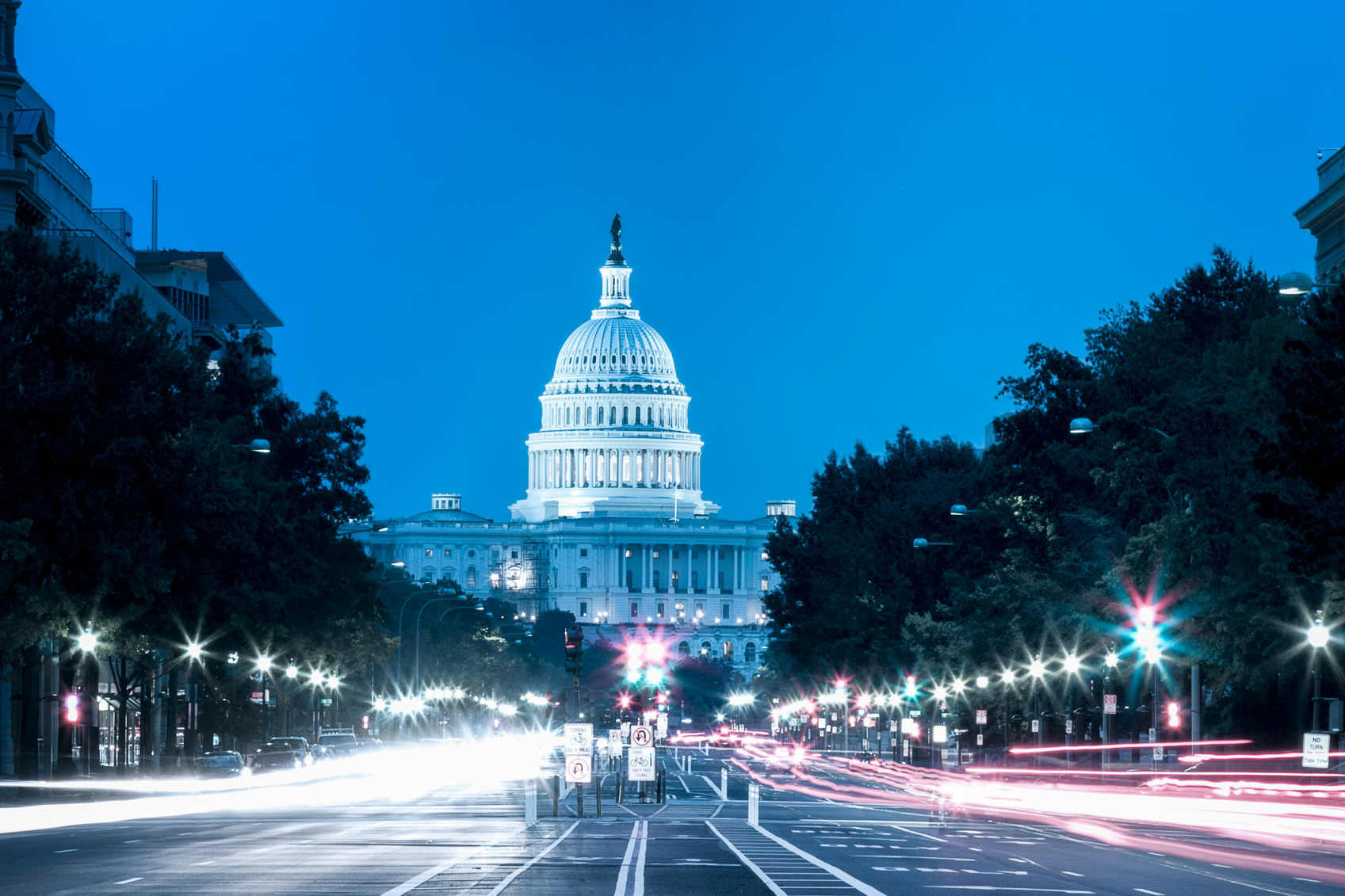 United States Capitol Building Night View with Car Lights Trails